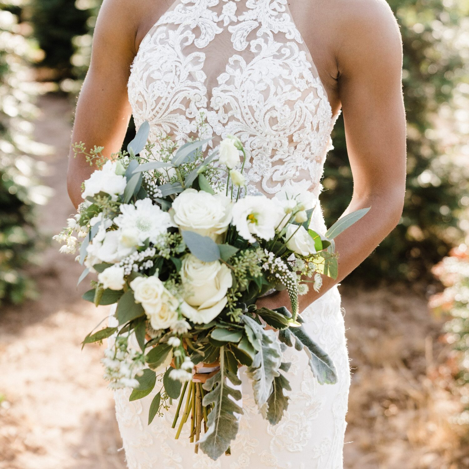 photo of a bride holding a Zupans floral bouquet