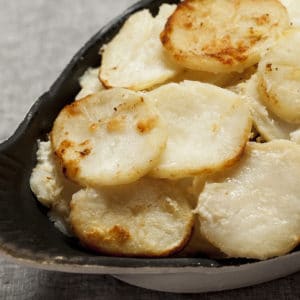 scalloped potatoes in a dish