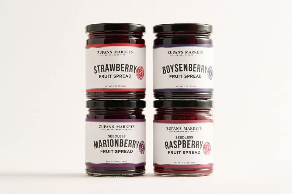 four jars of Zupan's Markets fruit spreads