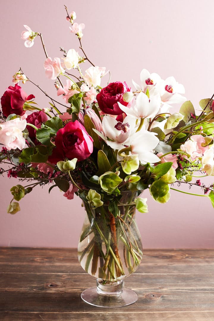 beautiful Zupan's Markets Valentine's Day peony bouquet in a glass vase