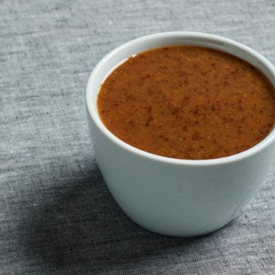 maple mustard glaze in a ramekin