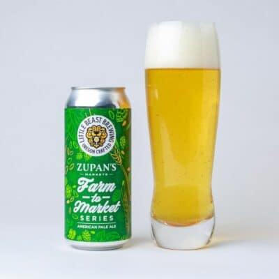 Zupan's Farm to Market beer next to poured glass