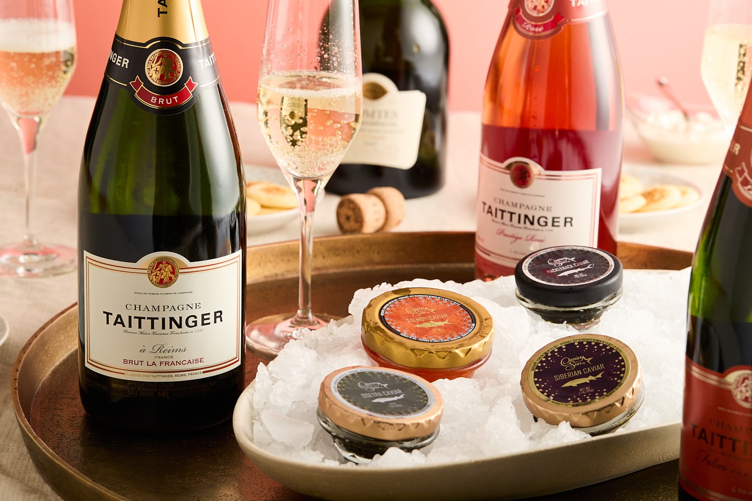 bottles of champagne and caviar