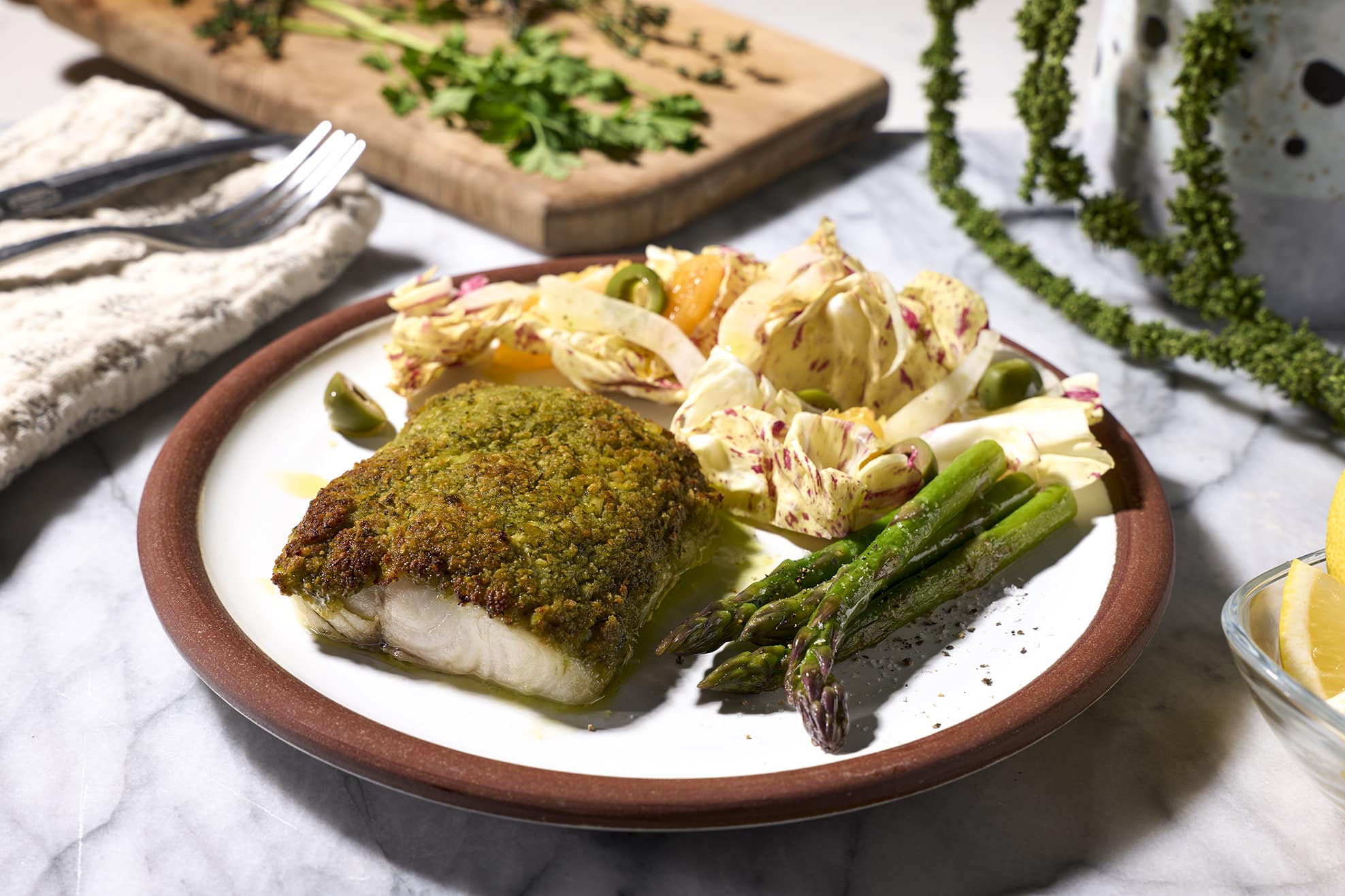 Pesto seafood dinner with asparagus on a plate