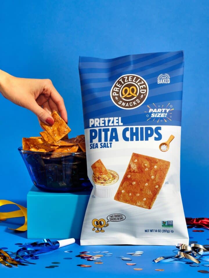 Pretzel Pita Chips bag with a blue background