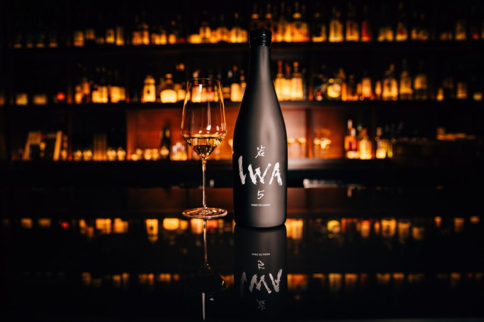 IWA 5 Sake on a dark bar top